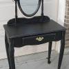 Old Black Vanity – After some sanding and repainting this old vanity was restored to a very nice antique look.